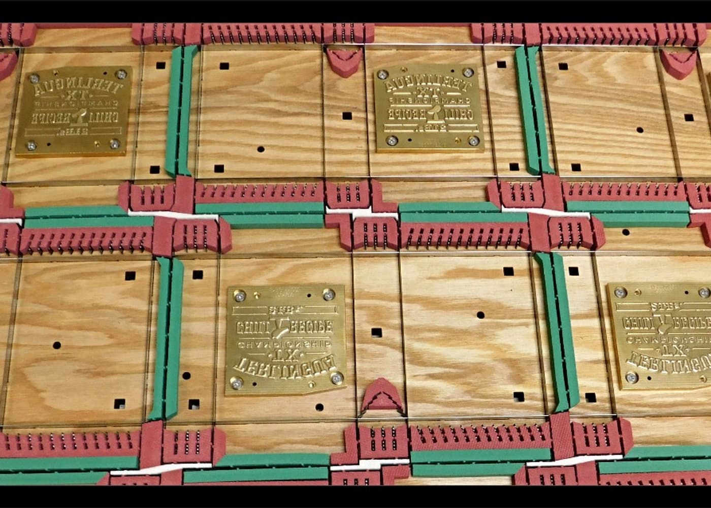 Steel rule dies mounted on plywood with colored ejection rubber